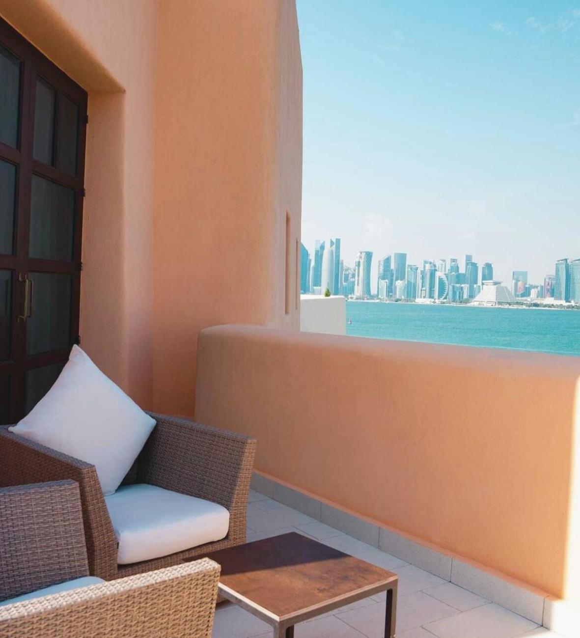 Mina Hotel And Residences By The Torch Доха Екстер'єр фото View of the Doha skyline from the hotel