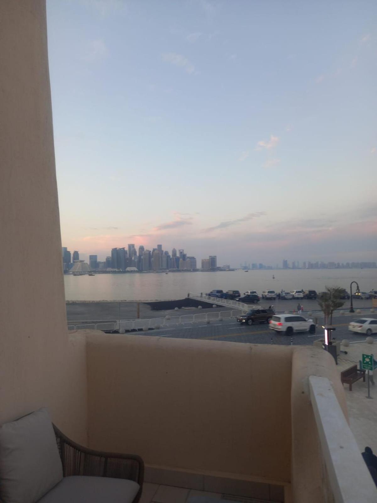 Mina Hotel And Residences By The Torch Доха Екстер'єр фото View of Manama skyline from a residential area in Saar