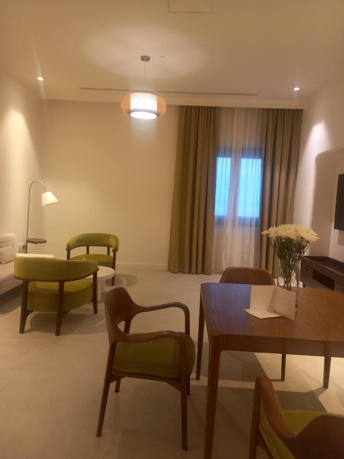 Mina Hotel And Residences By The Torch Доха Екстер'єр фото A room at the hotel