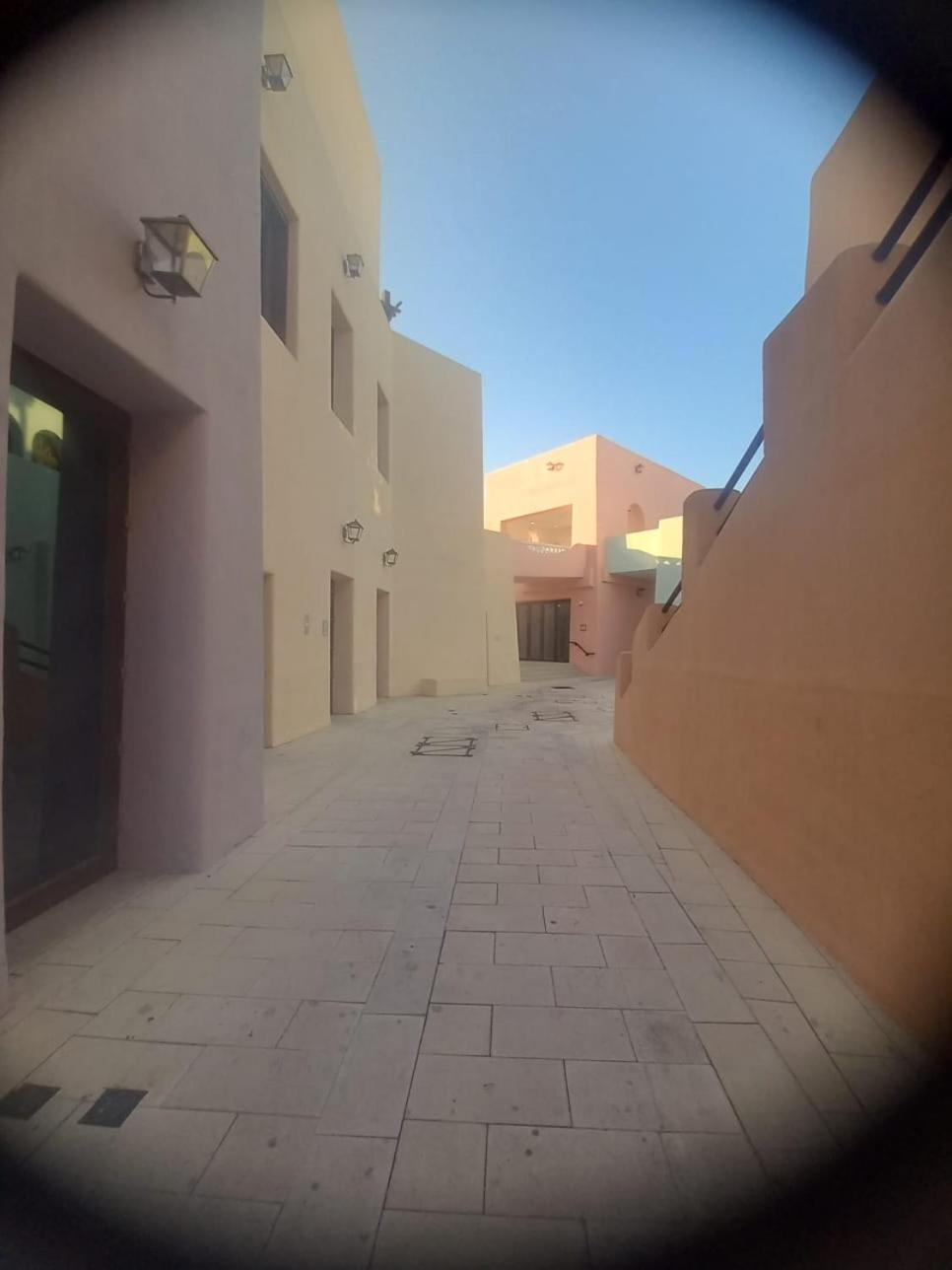 Mina Hotel And Residences By The Torch Доха Екстер'єр фото A street in Al-Qatif